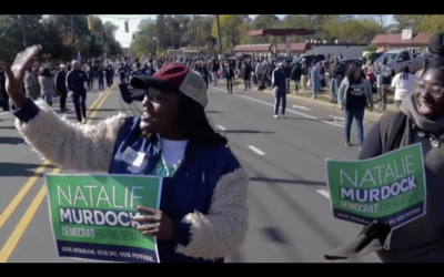 woman marching in parade