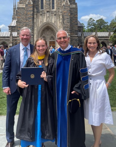 Mike Shannon, Sara Rose Shannon, Len White, and Jennifer Shannon in front of Duke Chapel on Sara Rose's graduation day.