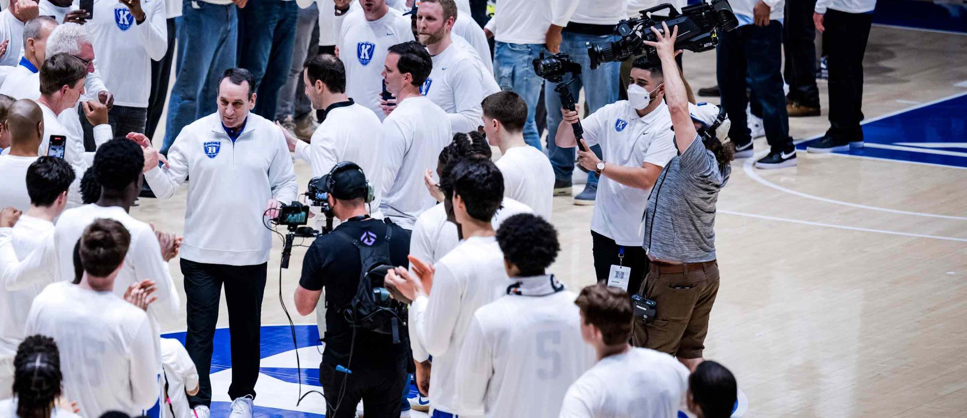 Coach K enters the court at Cameron Indoor Stadium at his last home game as head coach