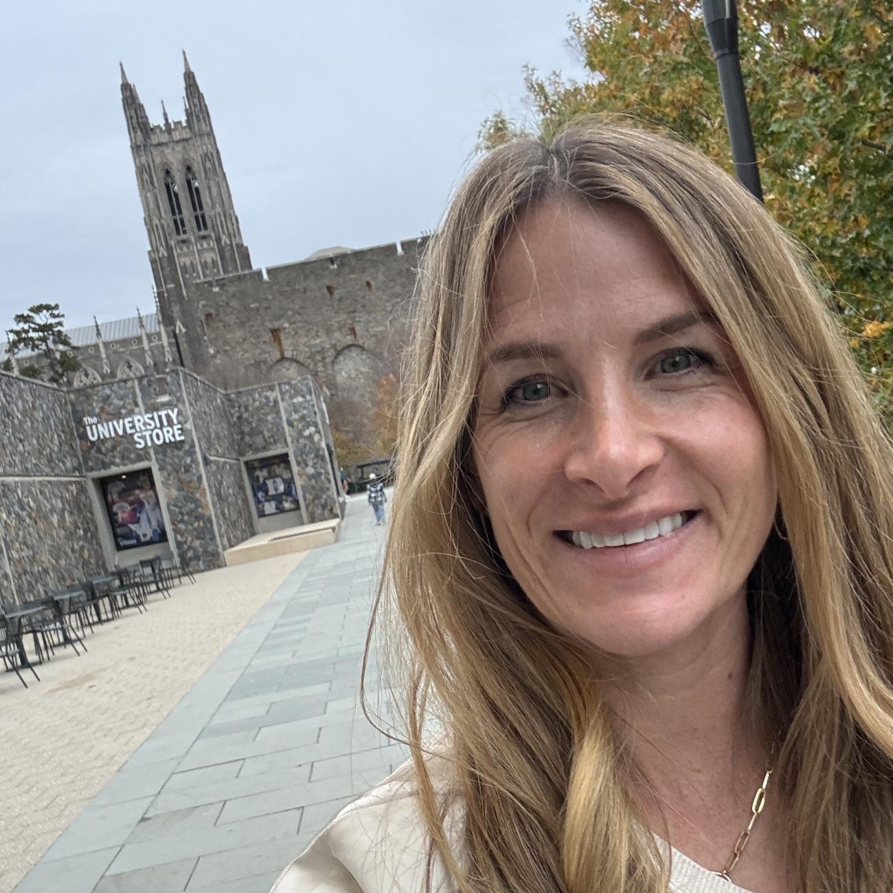 Lyndsay Lyle on campus in a selfie with Duke Chapel in the background.