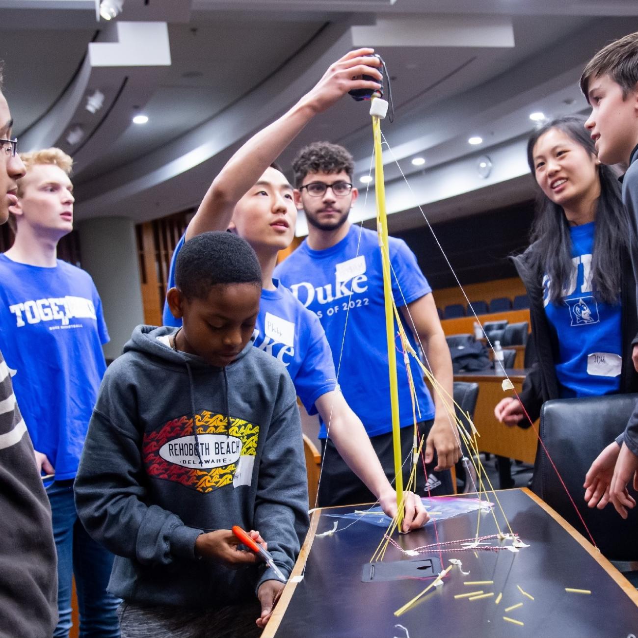A. James Clark Scholars host a STEM Leadership Camp for over twenty Durham middle-school students in spring 2019.