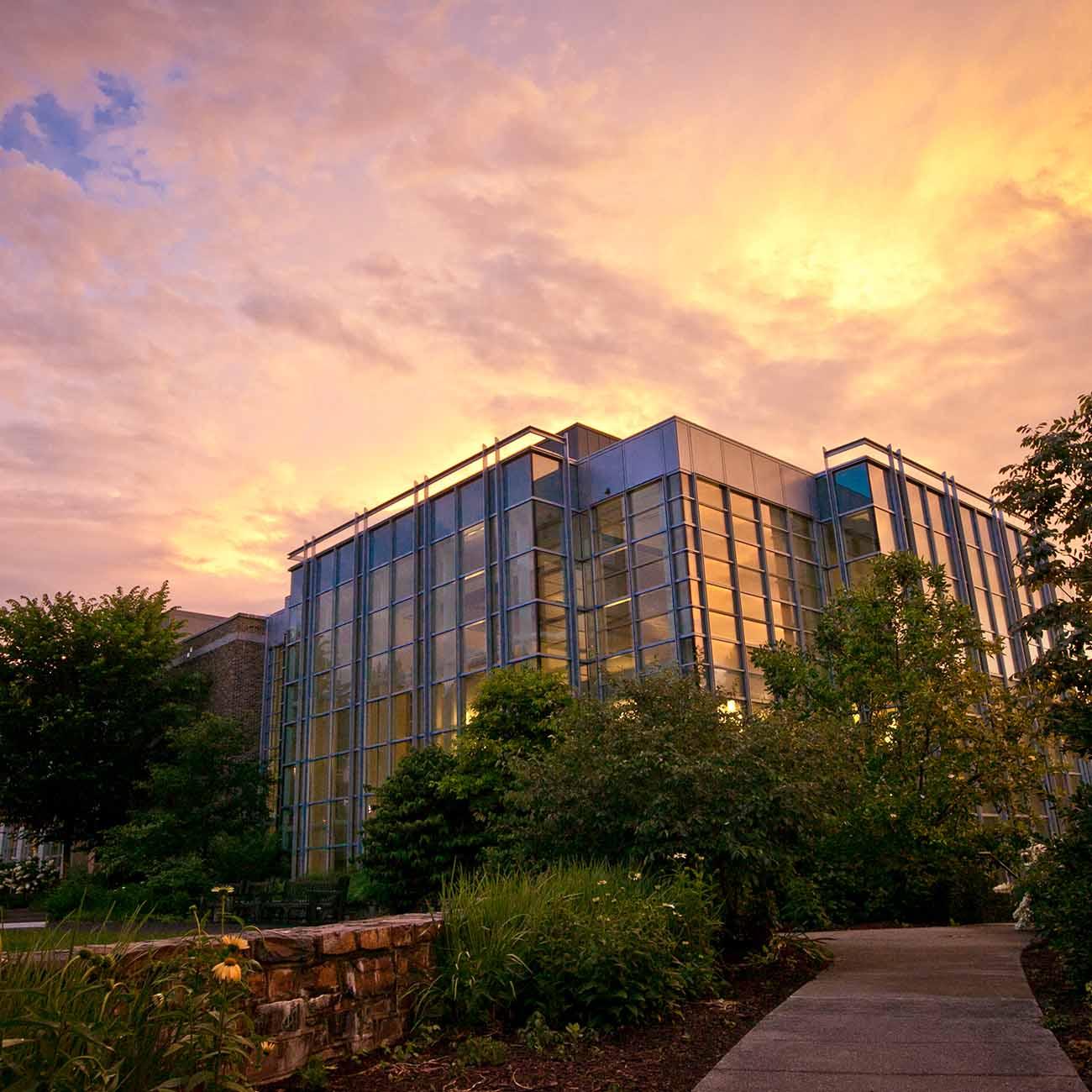 A photo of the Duke Law building at sunset.