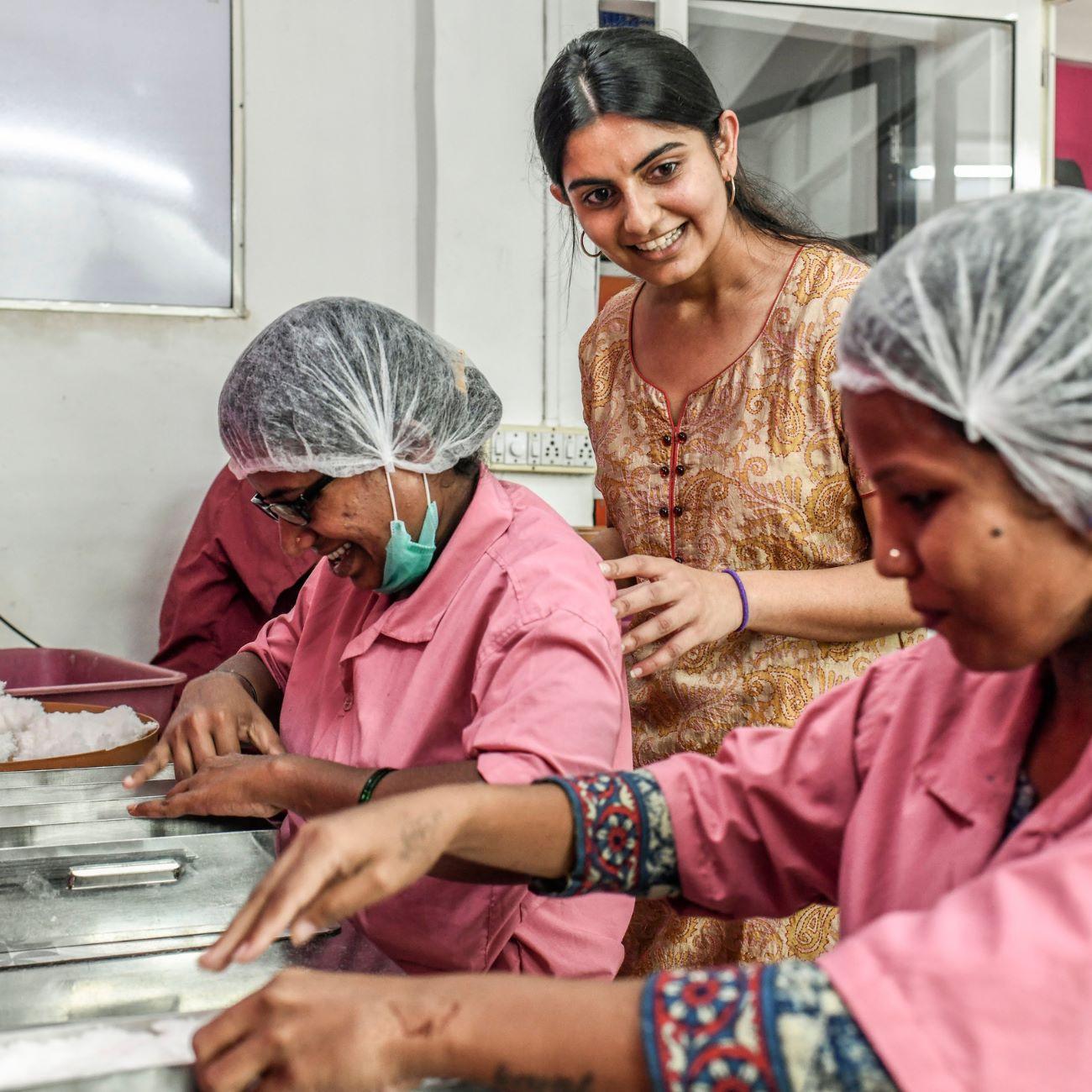 Suhani Jalota speaking with women in India